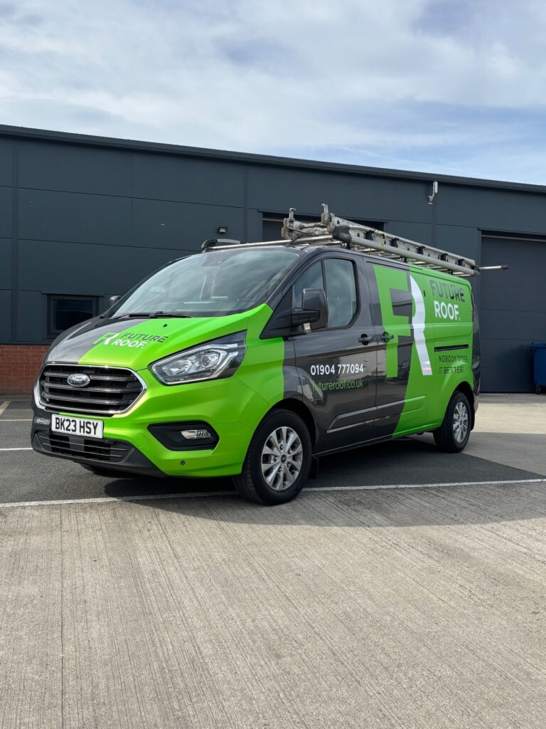 Front three-quarter view of the new Future Roof van wrapped by Mesi Graphix